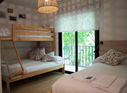 Ένα ή περισσότερα κρεβάτια σε δωμάτιο στο Latas Surf Lodge