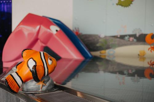 a toy fish sitting on top of a table at Familienhotel Huber in Valles