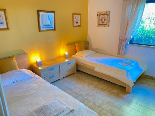 Postel nebo postele na pokoji v ubytování Albufeira Praia São Rafael Sun Apartment