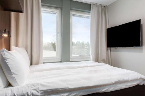 Postel nebo postele na pokoji v ubytování Sure Hotel Studio by Best Western Bromma