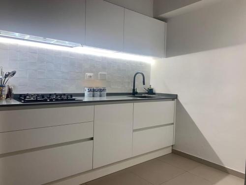 A kitchen or kitchenette at Lola Loft