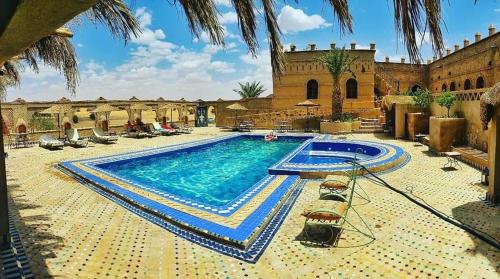 The swimming pool at or close to Kasbah Azalay Merzouga