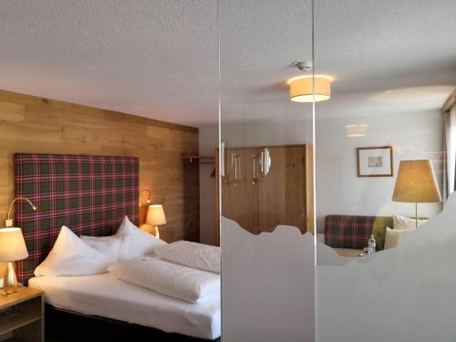 Alpenresort Walsertalにあるベッド