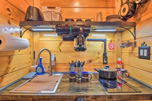 a kitchen with a sink and a counter top at The Lodge Nantahala River in Bryson City