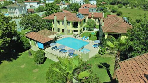 an aerial view of a house with a swimming pool at Summer Life Villa Apart in Dalyan