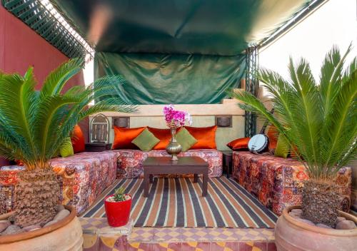 Uma área de estar em Riad l'Heure d'Eté