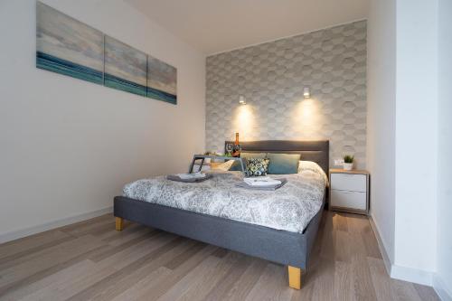 Posteľ alebo postele v izbe v ubytovaní Ideal Apartments Grobla