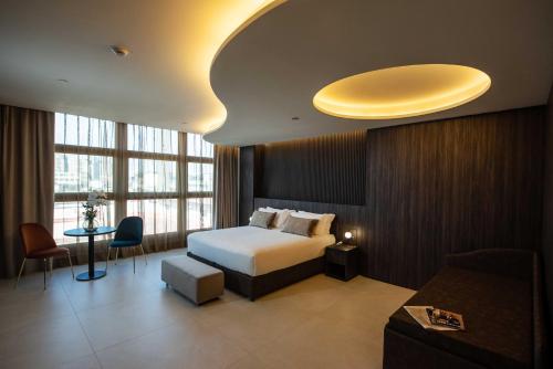 Area tempat duduk di Gold Tower Lifestyle Hotel