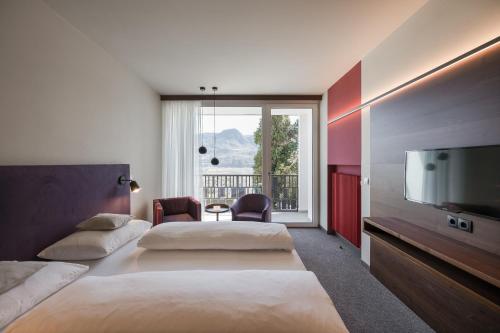 Postel nebo postele na pokoji v ubytování Hotel Braunsbergerhof