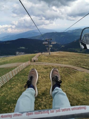 a person sitting on the top of a ski lift at Alpengasthof Tanzstatt in Lachtal