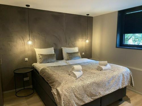 Postel nebo postele na pokoji v ubytování Luxe apartment - Ooststraat 8a Domburg