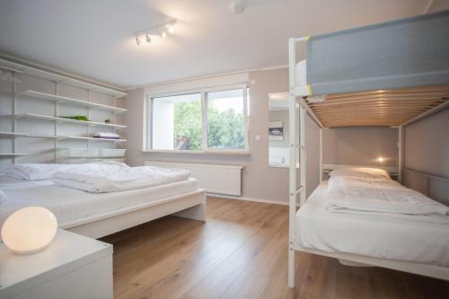 מיטה או מיטות בחדר ב-Apartment - Am Bergelchen 13-M Winterberg-Niedersfeld