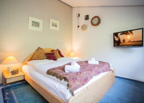Ένα ή περισσότερα κρεβάτια σε δωμάτιο στο Holidayhome - Margaritenweg 17-R Niedersfeld