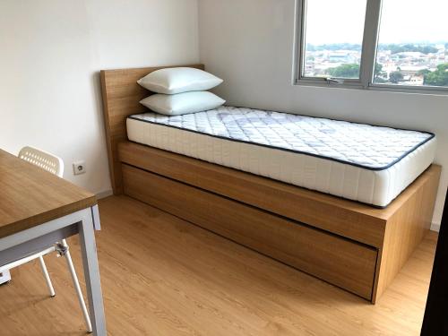Ένα ή περισσότερα κρεβάτια σε δωμάτιο στο Zen Inspired 2-bedroom Apartment with Mountain City View