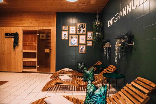a restaurant with chairs and a table in a room at XXL Ferienhaus Goldberger See - Sauna - 16 Personen in Goldberg