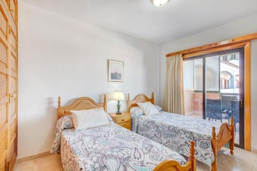 Postel nebo postele na pokoji v ubytování Apartamento Atlantic View