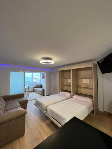 Voodi või voodid majutusasutuse Hany apartment Ducado 11-C toas