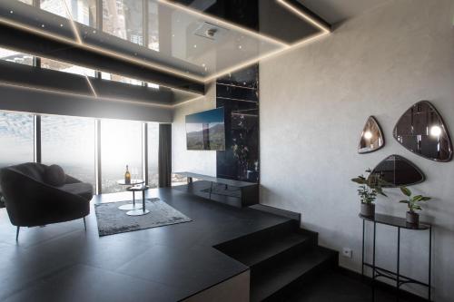 Гостиная зона в In The Sky - Apartamenty w Sky Tower