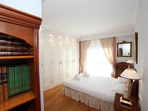 Posteľ alebo postele v izbe v ubytovaní Apartamento Ondarreta