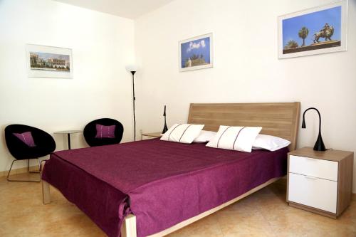 Ένα ή περισσότερα κρεβάτια σε δωμάτιο στο B&B Siciliò