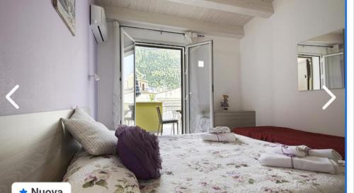 A bed or beds in a room at Appartamento francy