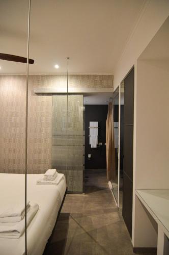 Postel nebo postele na pokoji v ubytování Flatinrome Rooms in Trastevere