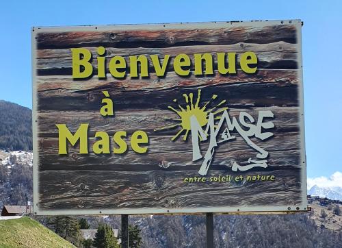 a sign for anance massume on a mountain at Gîte de Mase sur la rive droite du Val d'Hérens in Mase