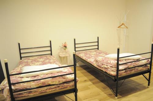 Säng eller sängar i ett rum på 04 village Namba - Vacation STAY 02386v