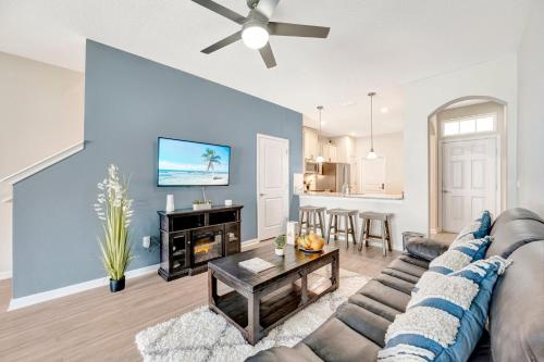 a living room with a couch and a table at ZenHomes in heart of Brandon convenient location in Brandon