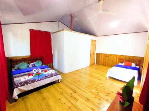 Ένα ή περισσότερα κρεβάτια σε δωμάτιο στο The Sunset Tucano Lodge