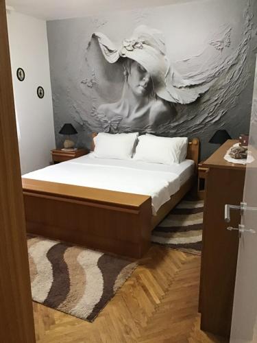 Ένα ή περισσότερα κρεβάτια σε δωμάτιο στο BMB Apartments Kotor