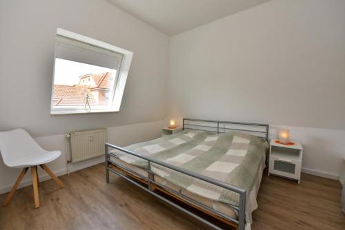 Posteľ alebo postele v izbe v ubytovaní Haus "Luv und Lee" Appartement LEE05