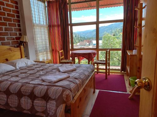 Postel nebo postele na pokoji v ubytování Banderas B&B