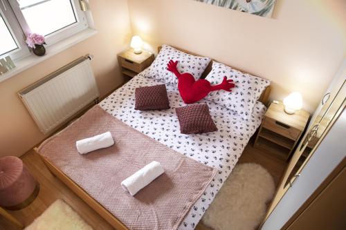 Posteľ alebo postele v izbe v ubytovaní Apartman Tara