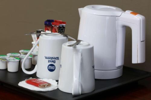 a counter with two white appliances on a table at Best Western Claydon Hotel in Ipswich