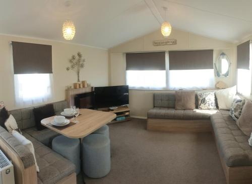 Posezení v ubytování Griffiths, Seaview Caravan Park, Whitstable