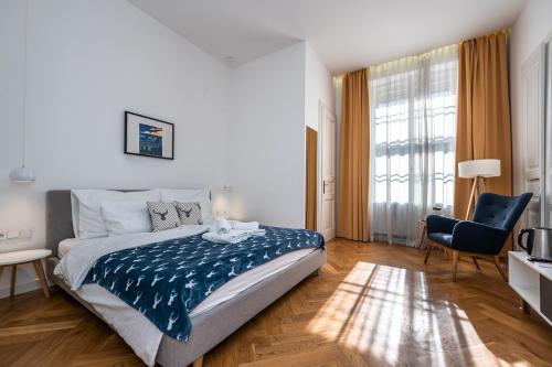Кровать или кровати в номере Apartrezidence Opletalova