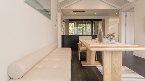a dining room with a table and chairs at Albescent Poolvilla in Gyeongju