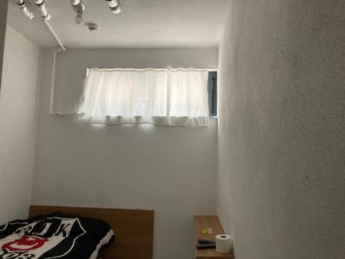 Postel nebo postele na pokoji v ubytování NR1 HOTEL