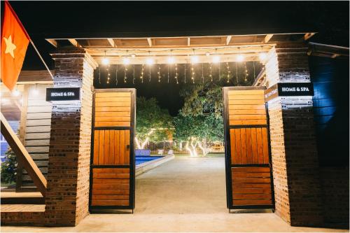 an entrance to a building with two open doors at Ninh Binh The View Point Home & Spa in Ninh Binh