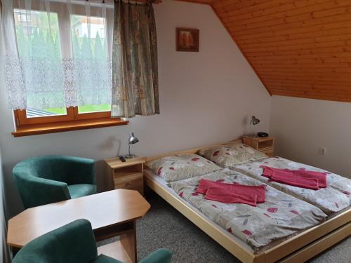 Postel nebo postele na pokoji v ubytování Chata Aneta