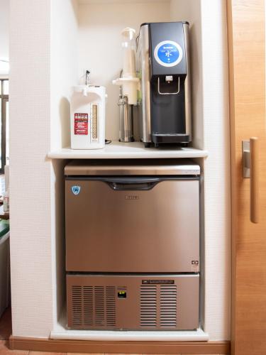 Tabist 浜戸屋旅館 男性専用にあるキッチンまたは簡易キッチン