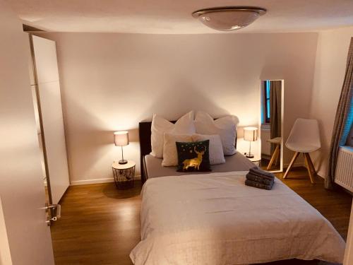 Katil atau katil-katil dalam bilik di FELIX LIVING 2, Cozy & modern & Netflix Wohnung mit Blick ins Grüne