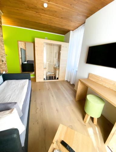 TV a/nebo společenská místnost v ubytování La Filanda Relax&Gourmet