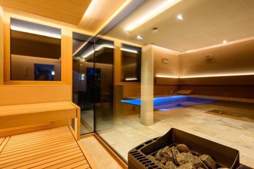 a swimming pool in the middle of a house at eichberg living in Leutschach