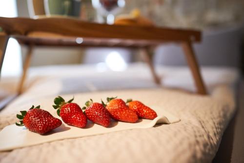 Postel nebo postele na pokoji v ubytování La Filanda Relax&Gourmet