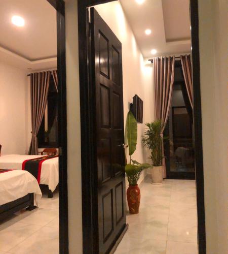 Un ou plusieurs lits dans un hébergement de l'établissement Hoi An Sunny Garden