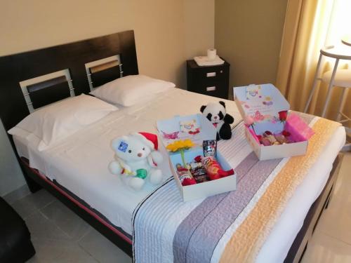 Кровать или кровати в номере HOSTAL LA NOCHE - Pisco