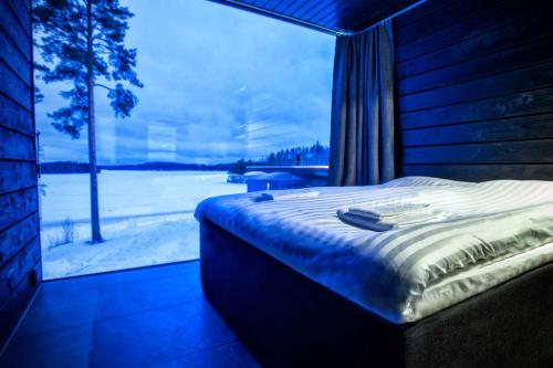 Ellivuori Resort tesisinde bir odada yatak veya yataklar