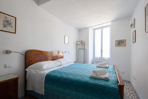 A bed or beds in a room at Casa GiGio 011030-LT-0223